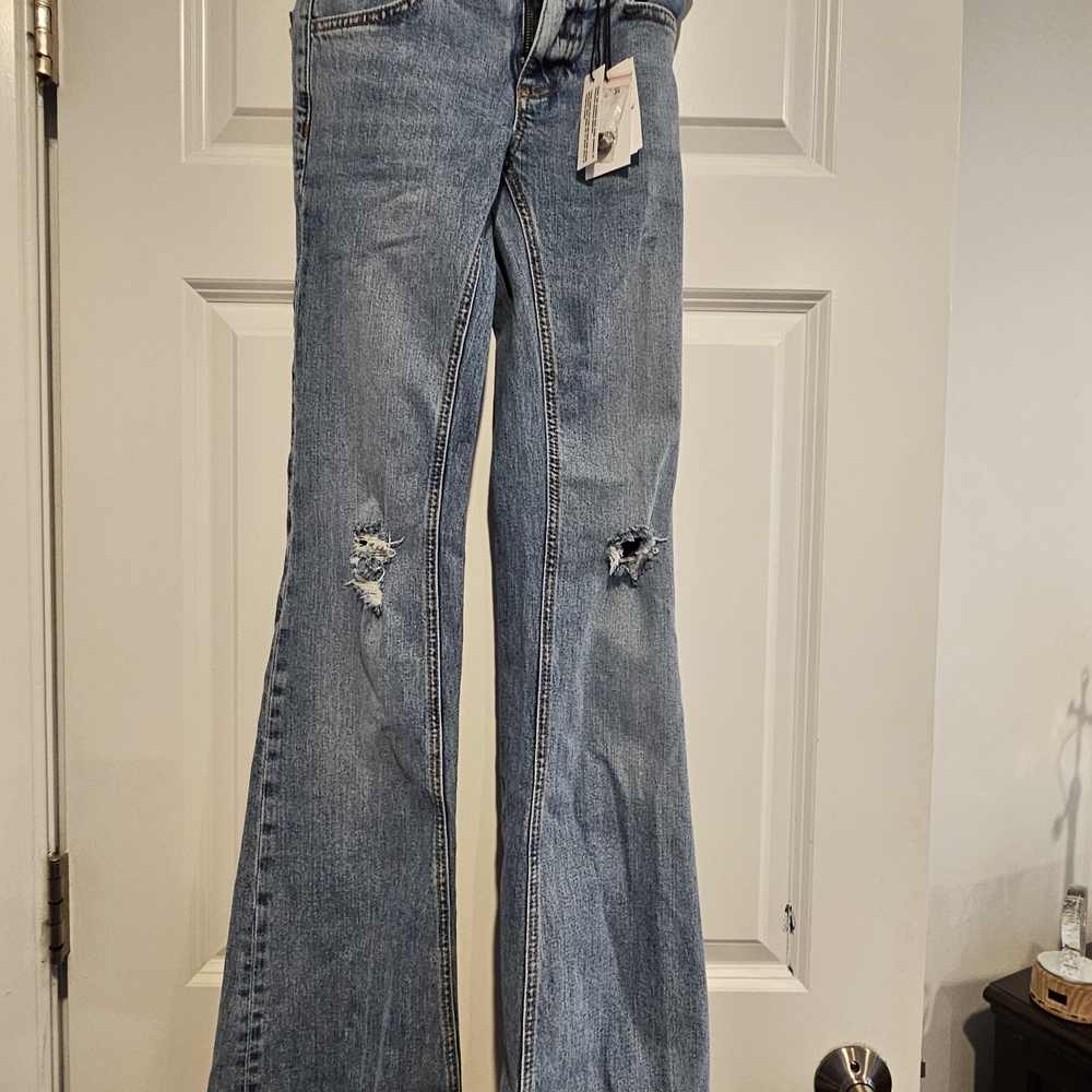 Subdued Blue Distressed Women Jeans